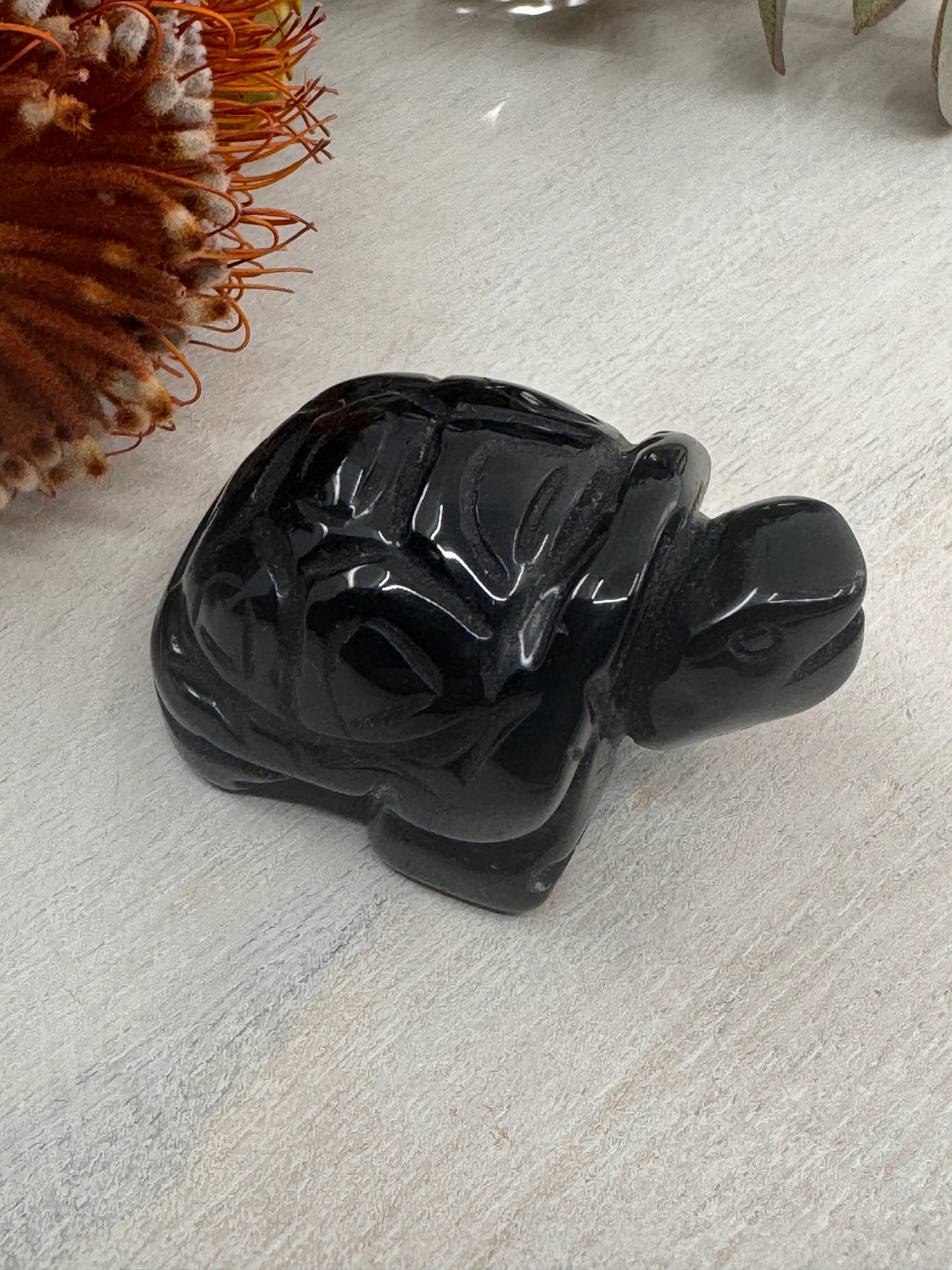 Black Obsidian Turtle Carving 5 cm × 3.5 cm – glossy black crystal turtle symbolising protection, grounding and clarity, Inspired By 3 Australia.