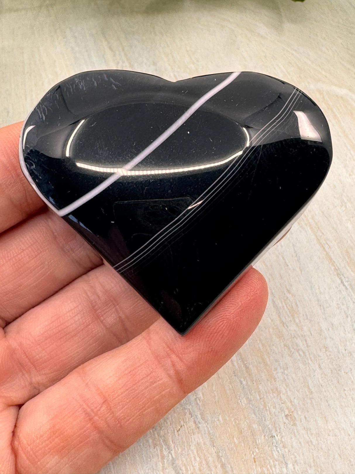 Banded Black Agate Heart - "I release all behaviours that no longer serve me."