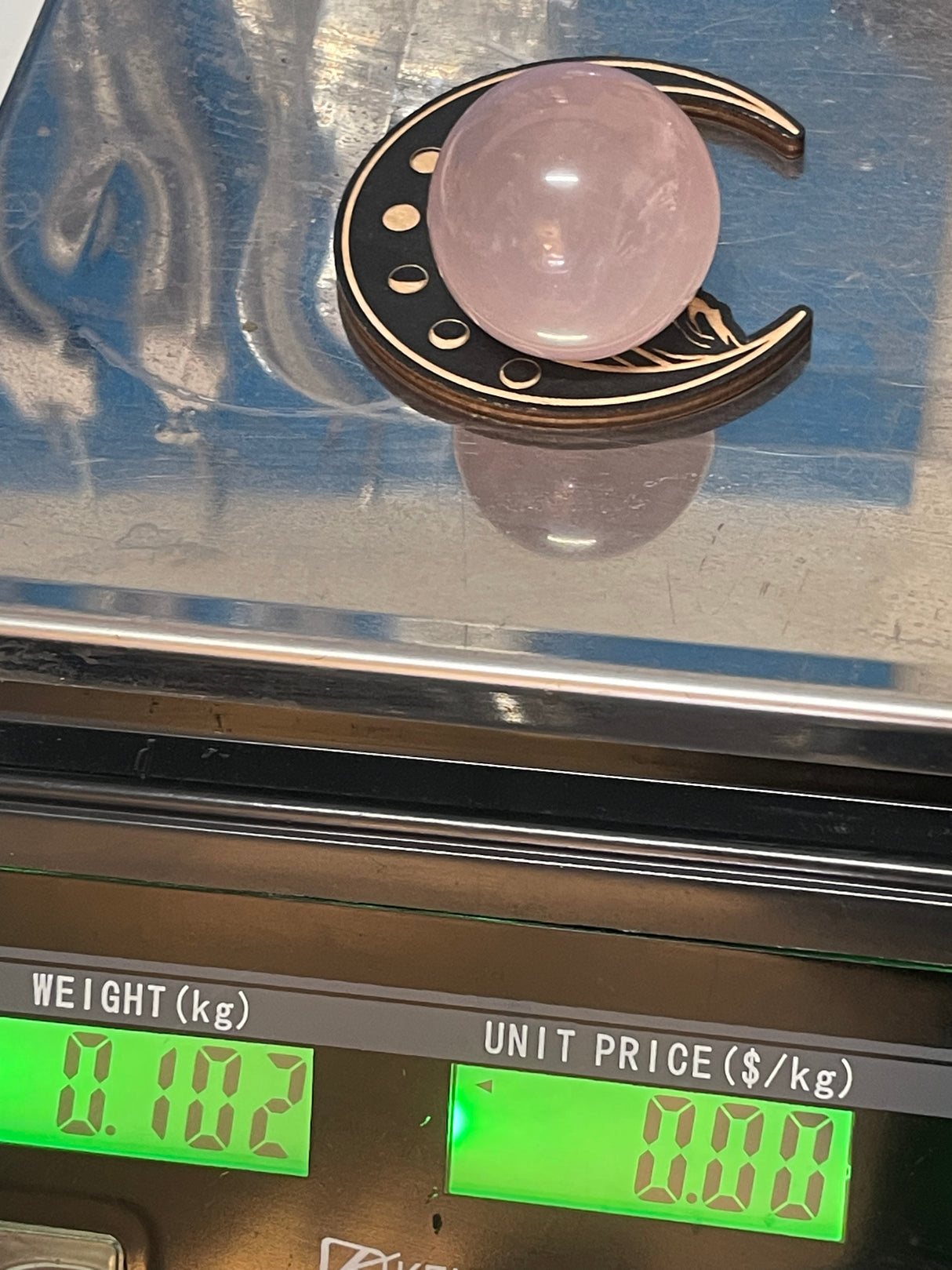 Rose Quartz Sphere on Moon Stand - “I radiate love, beauty, confidence and grace”.