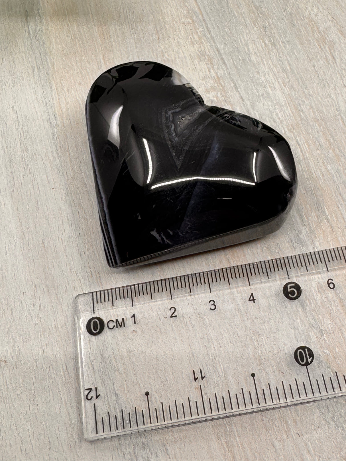 Banded Black Agate Heart - "I release all behaviours that no longer serve me."