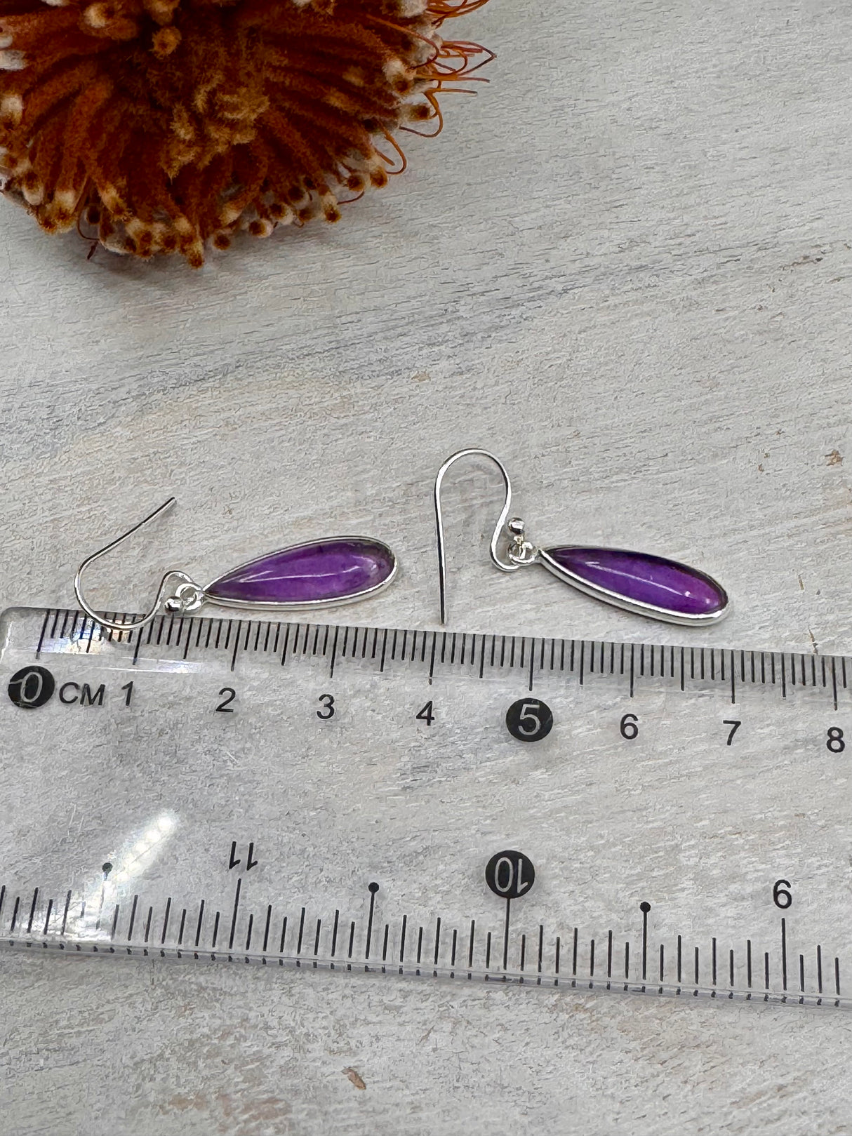 Purple amethyst gemstone drop earrings set in sterling silver