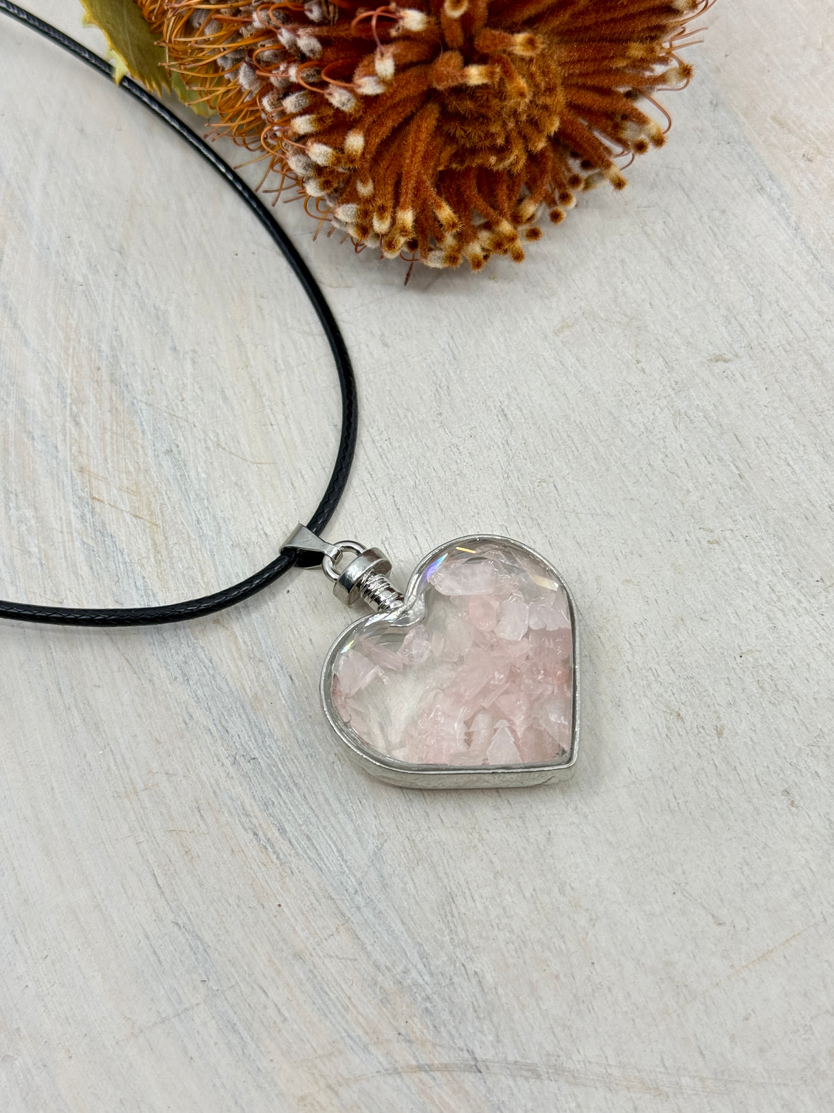 Rose Quartz heart bottle pendant 40x32x11mm glass with platinum-plated alloy – filled with crystal chips for love, harmony and healing – Inspired By 3 Crystals Australia.
