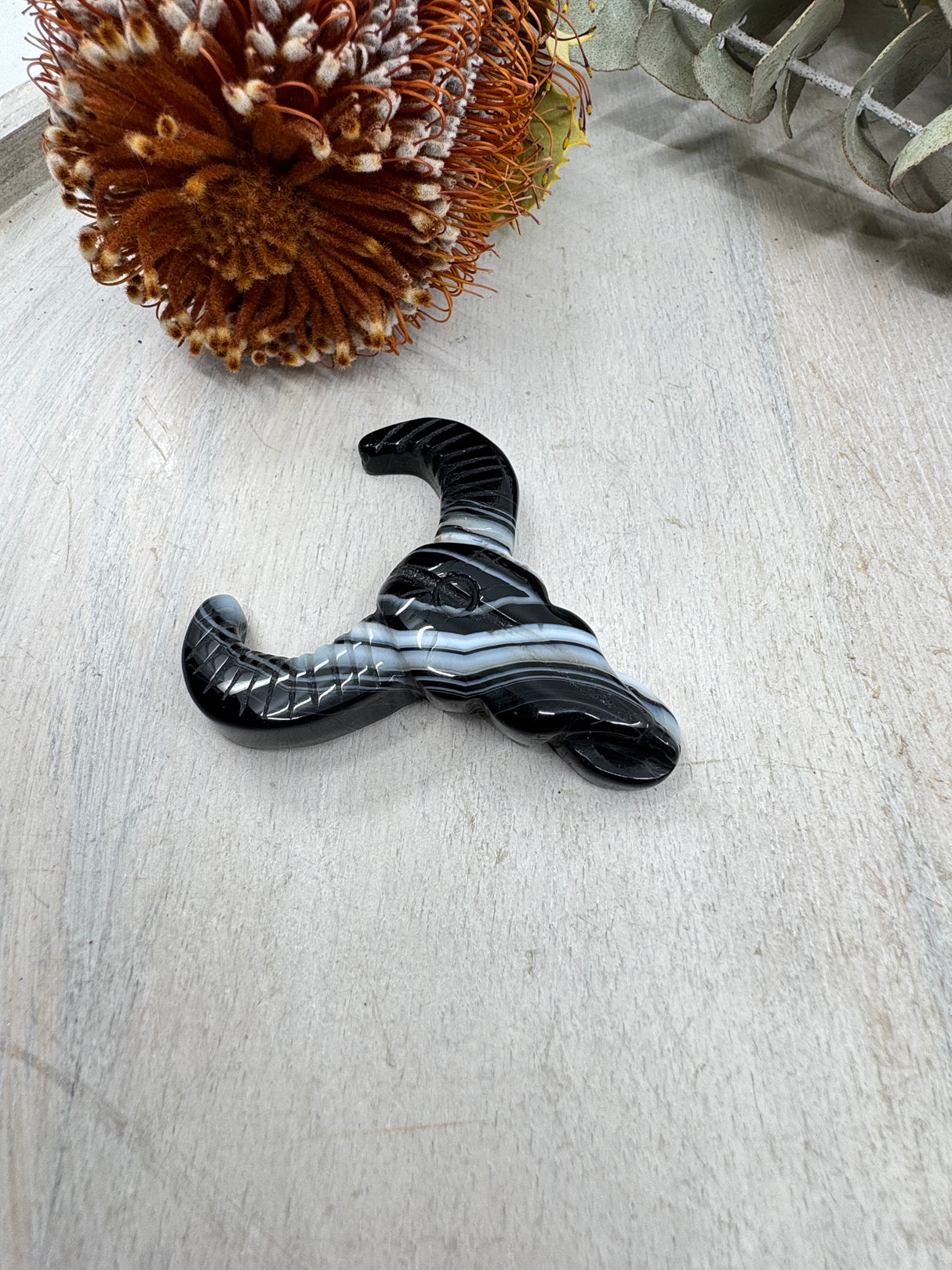 Black Banded Agate Ox carving 25g 6x5cm – layered black and white grounding crystal symbol of strength and protection – Inspired By 3 Crystals Australia.