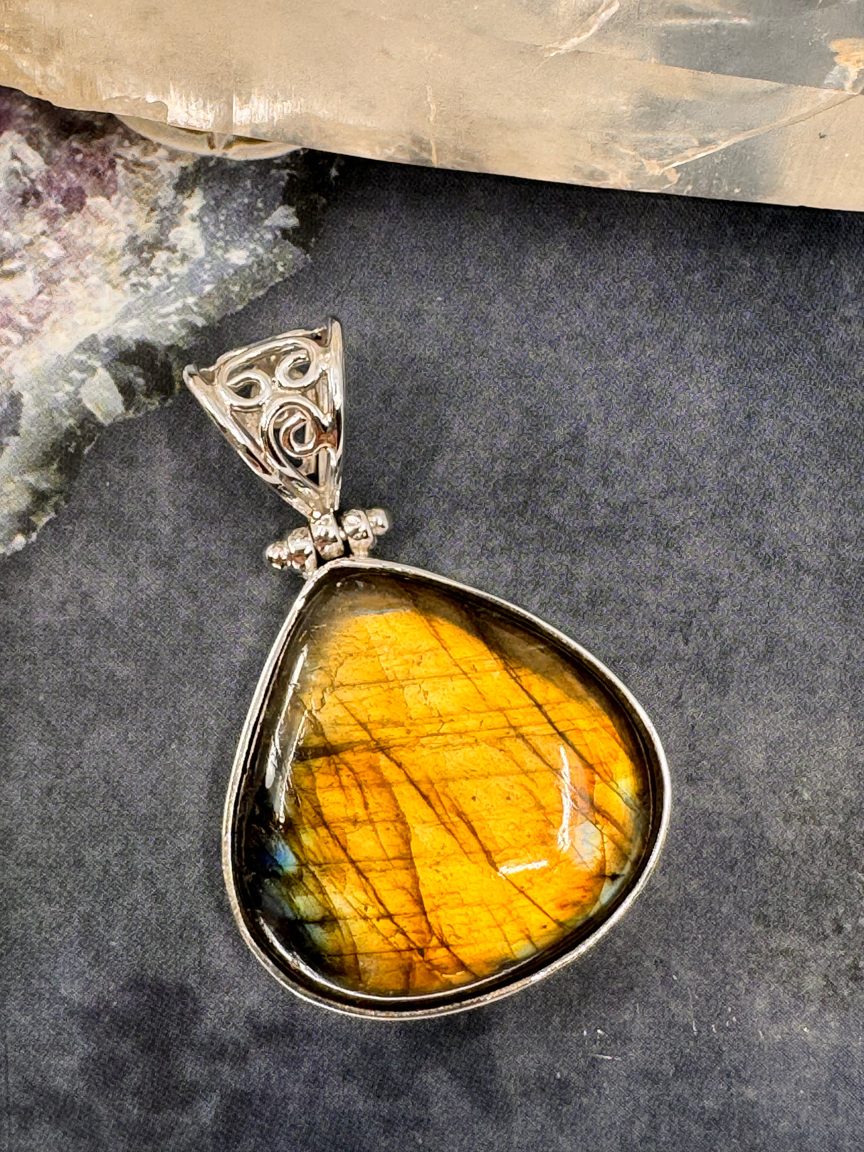 Labradorite Silver Pendant - “I welcome change and transformation into my life”.