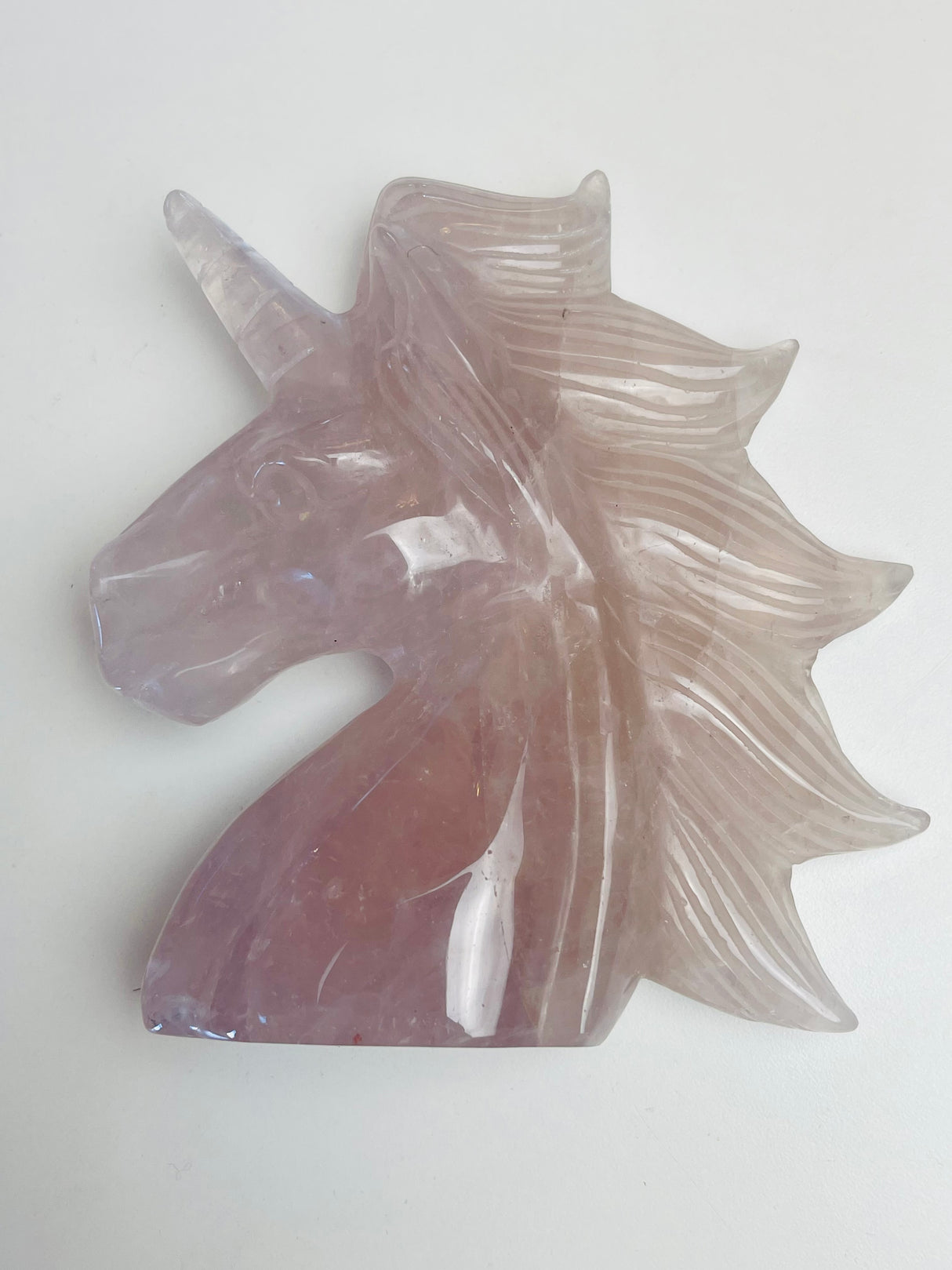 Rose Quartz Unicorn Carving 413g - “I radiate love, beauty, confidence and grace”.
