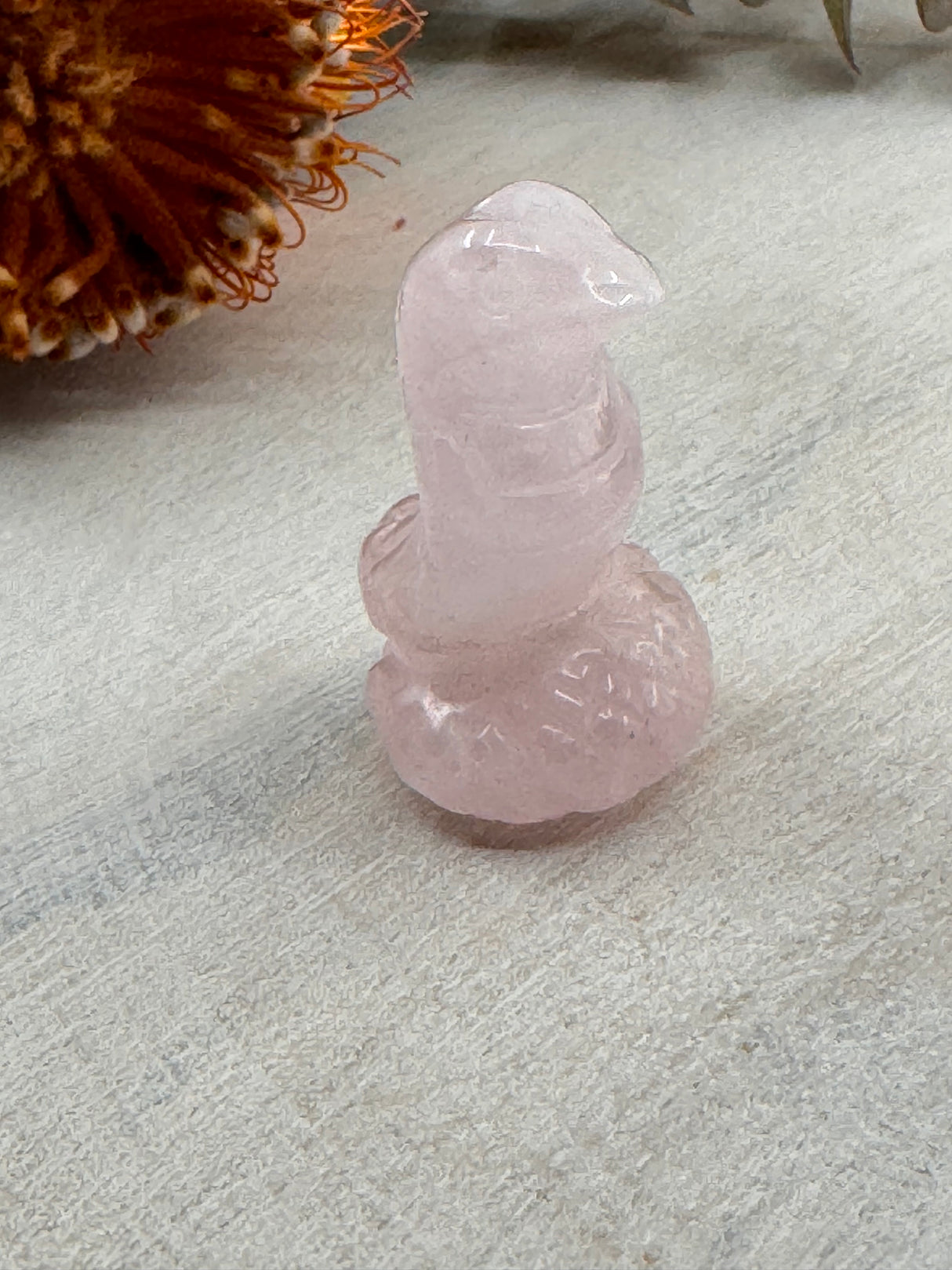 Rose Quartz Snake Carving 4 cm × 3 cm – soft pink crystal snake symbolising love, healing and emotional renewal, Inspired By 3 Australia.