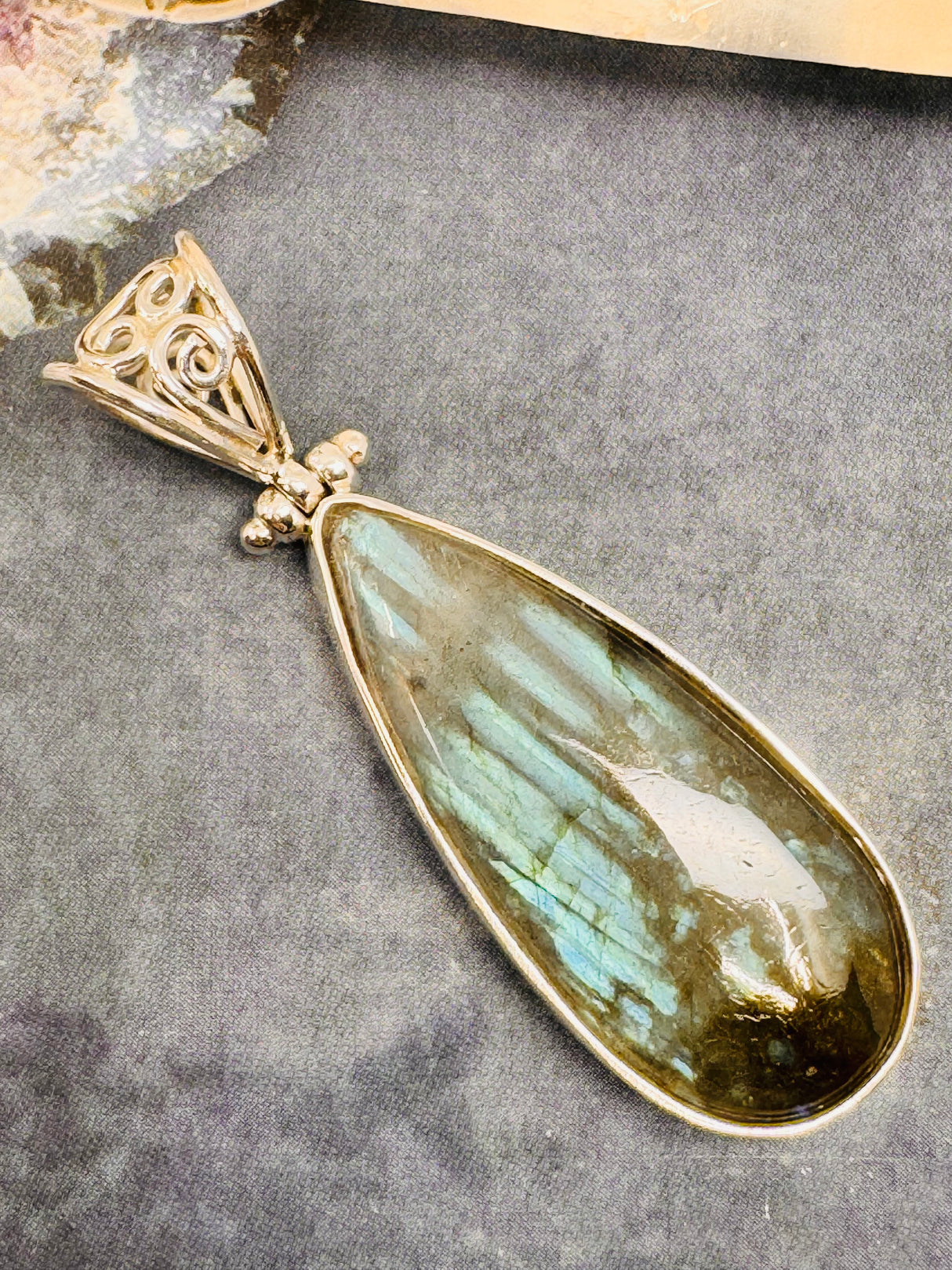 Labradorite Silver Pendant - “I welcome change and transformation into my life”.