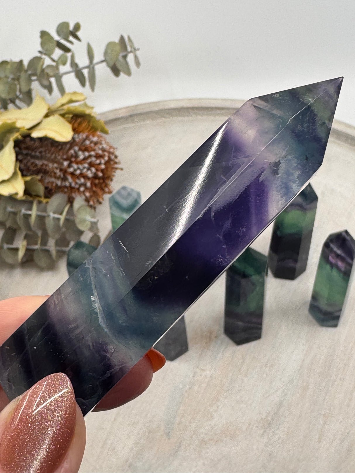 Rainbow Fluorite 6-Sided Points 7–8 cm × 2.5 cm – multicoloured crystal towers symbolising clarity, protection and balance, intuitively selected by Inspired By 3 Australia.