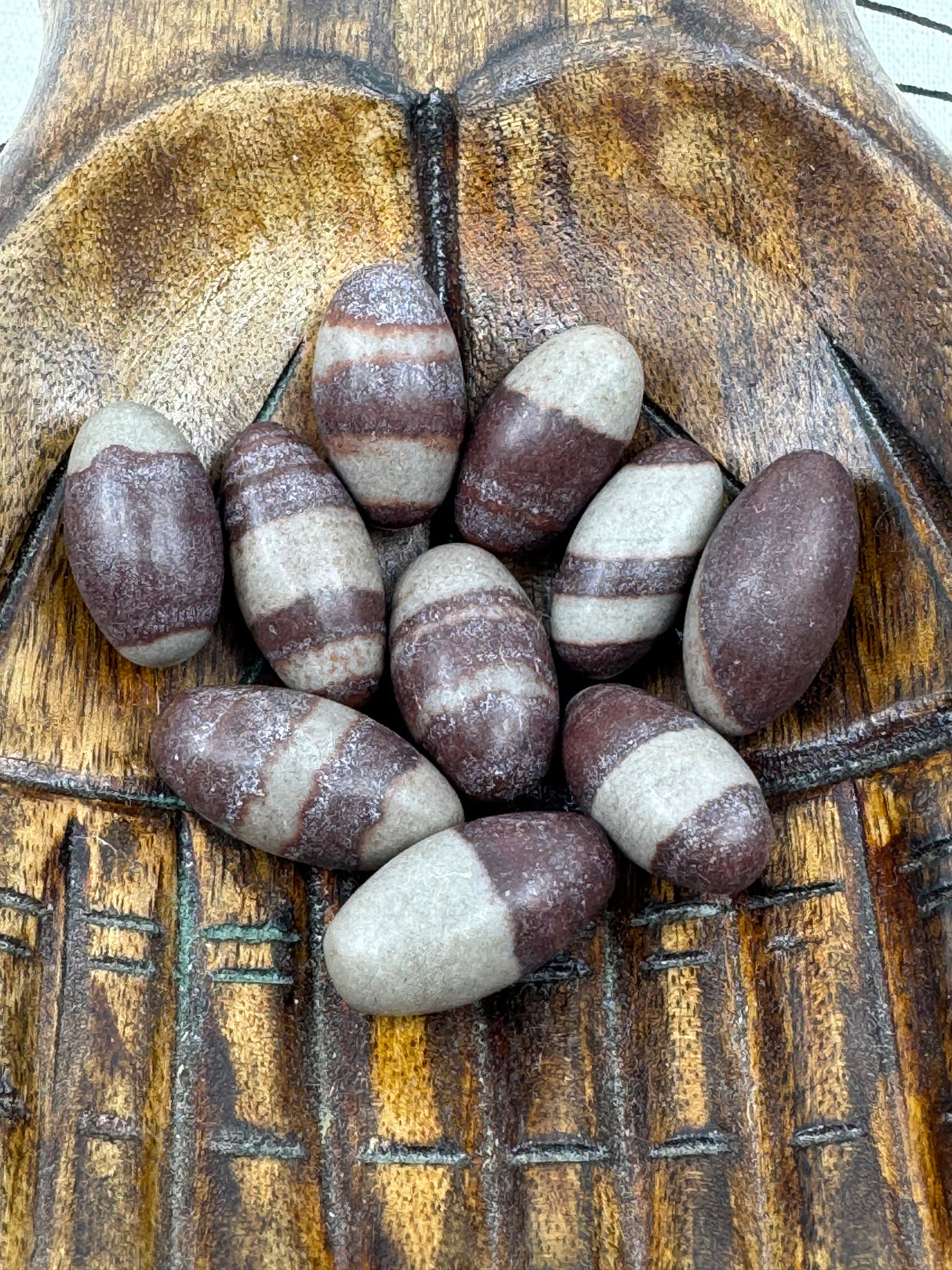 1-inch mini Shiva Lingam crystal from the Narmada River — sacred stone of balance, kundalini awakening, and transformation.