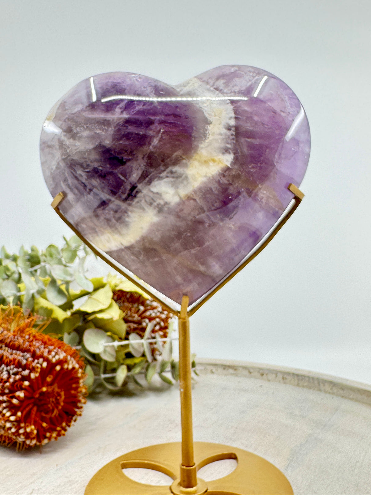 Chevron Amethyst heart on gold stand 892g 13x11cm – purple and white banded crystal for intuition, peace and protection – Inspired By 3 Crystals Australia.