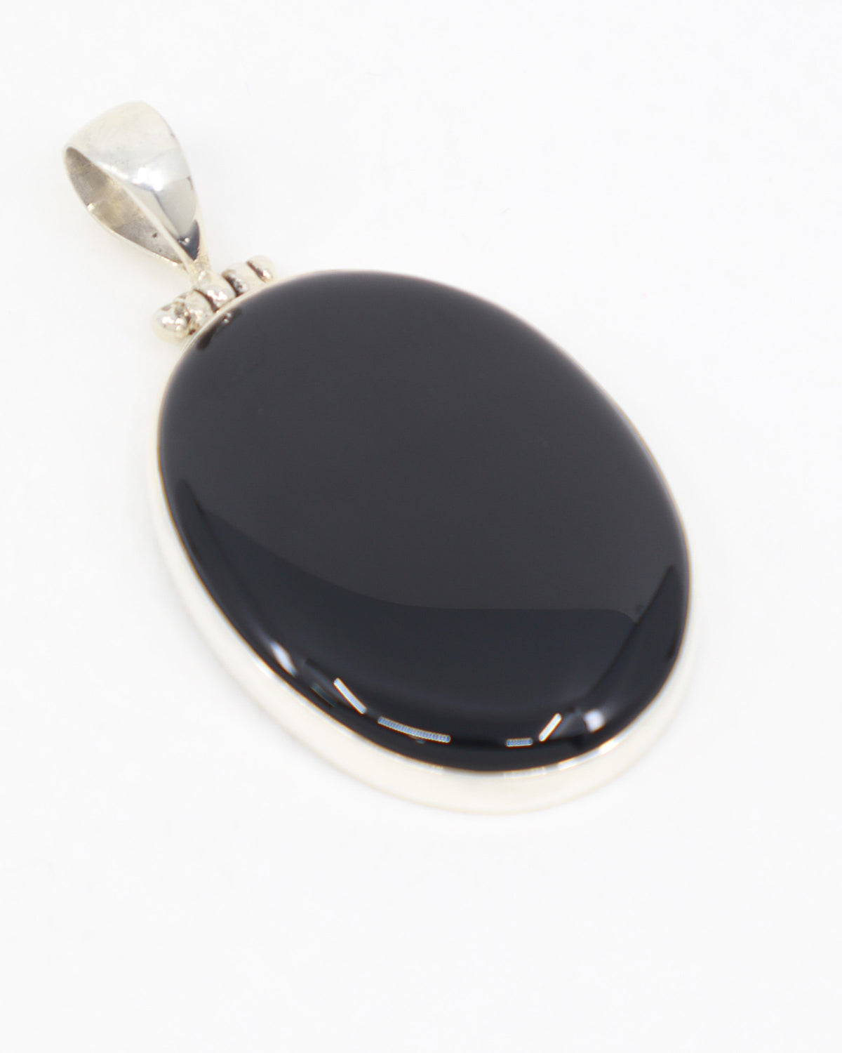 Black Onyx Sterling Silver Pendant – The Stone of Resolve | Strength & Protection