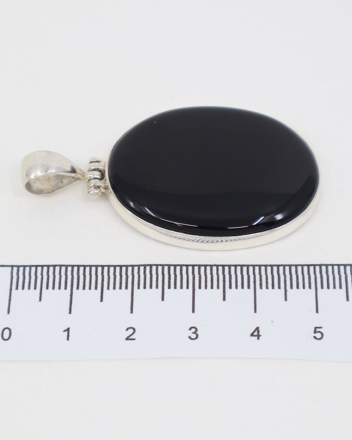 Black Onyx Sterling Silver Pendant – The Stone of Resolve | Strength & Protection