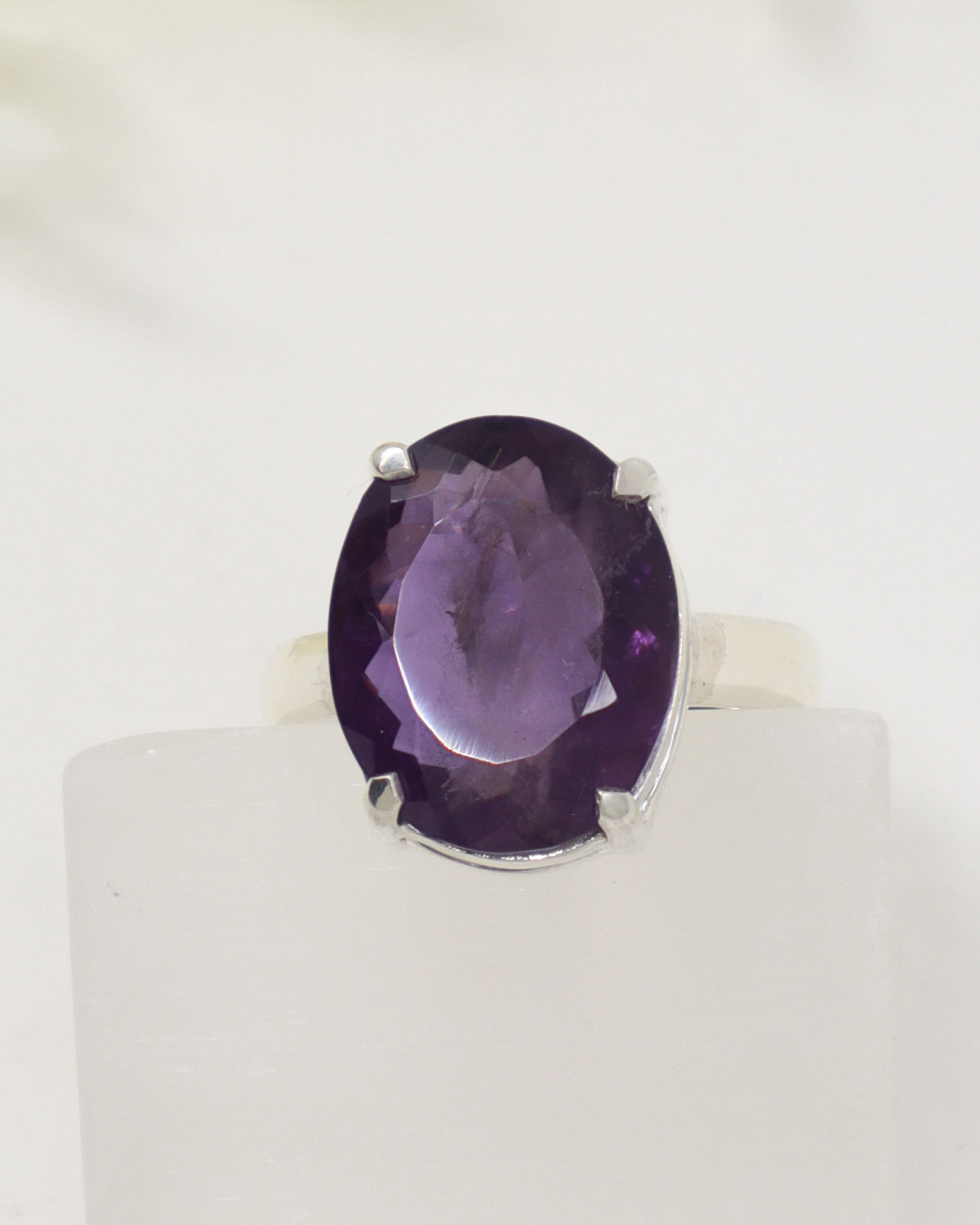 Brazilian Amethyst sterling silver ring size 9 with faceted oval purple gemstone in .925 silver, natural crystal jewellery Australia.