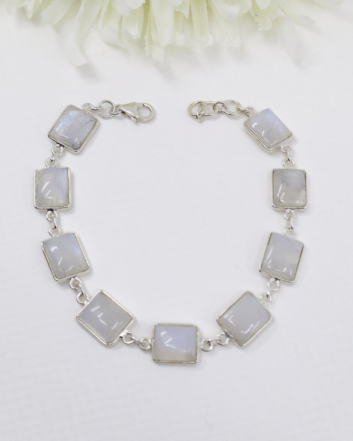 Rainbow Moonstone sterling silver bracelet with rectangular glowing moonstone cabochons and polished .925 silver links.