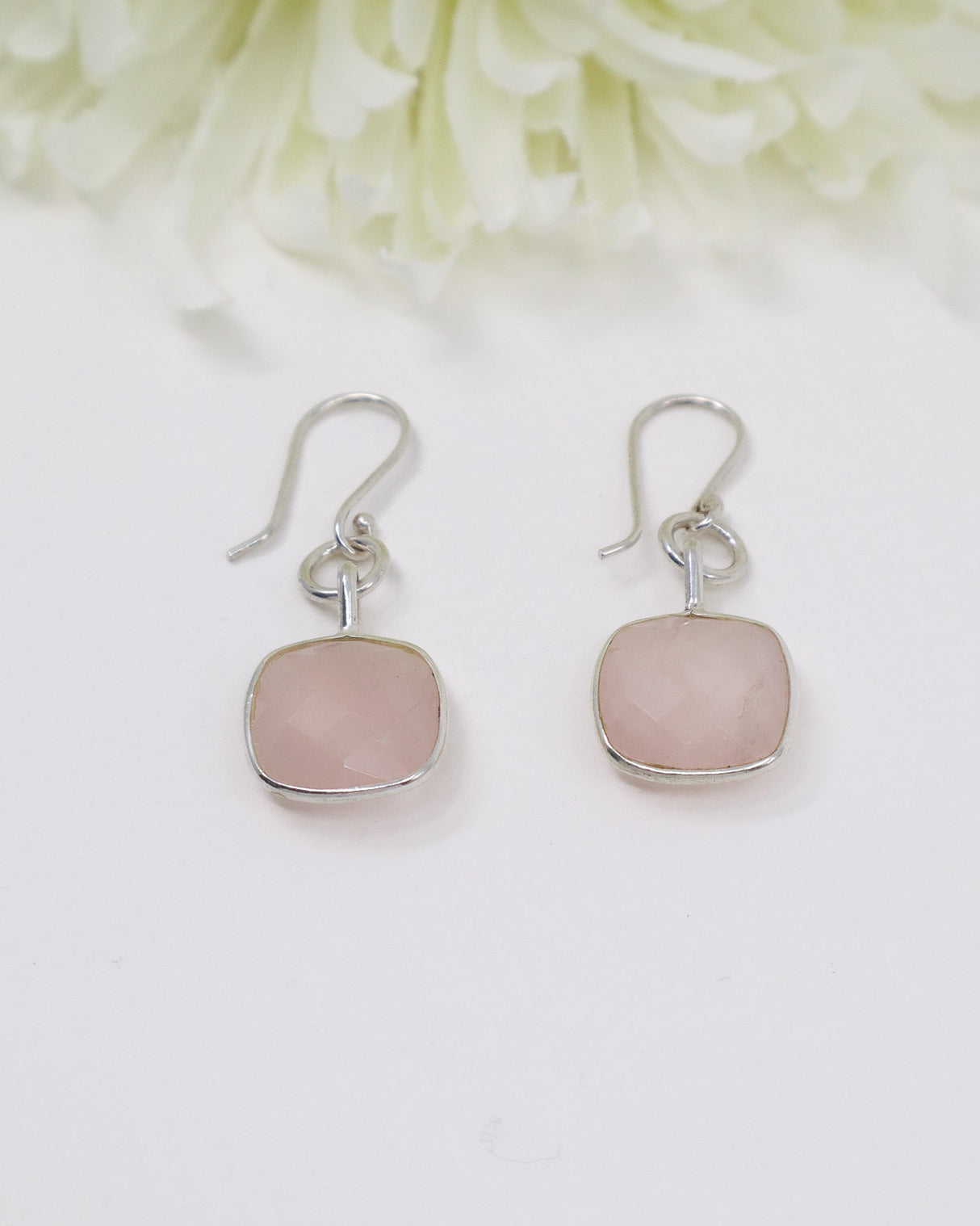 Rose Quartz sterling silver faceted drop earrings in polished sterling silver with soft pink healing crystal gemstones.