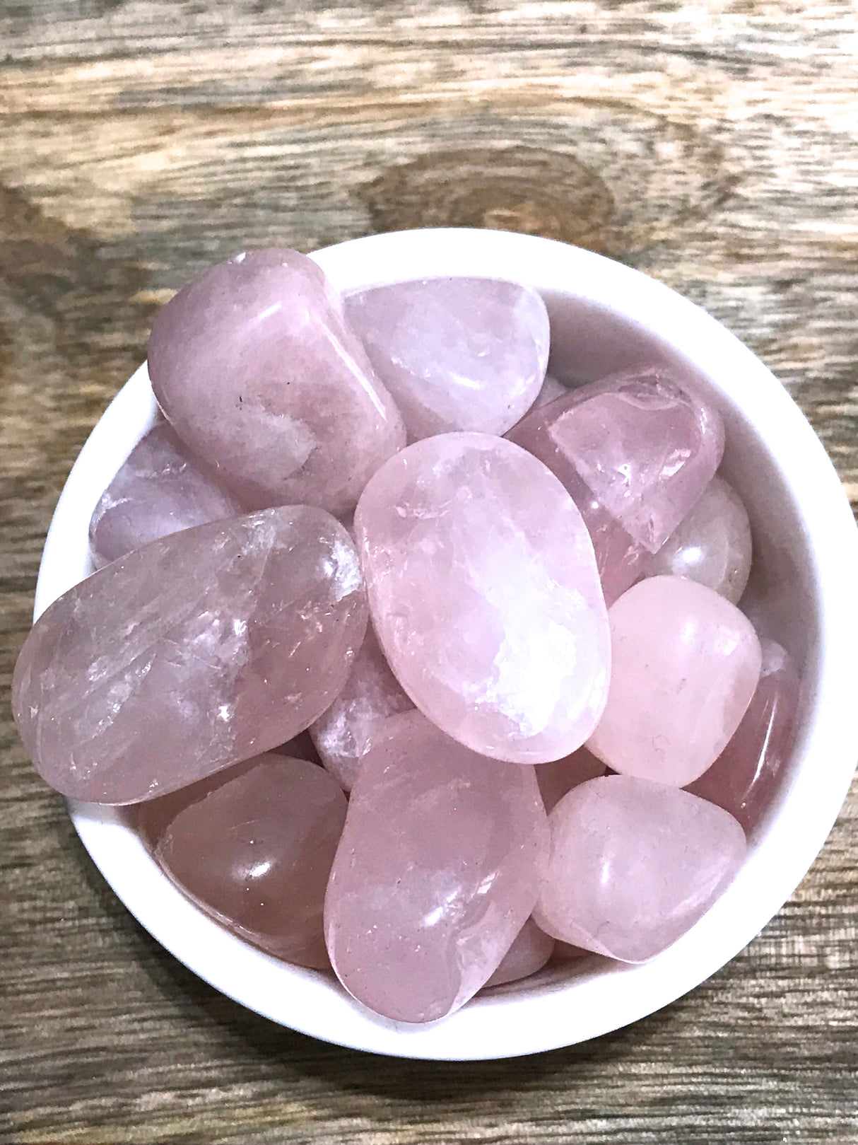 Rose Quartz tumbled stone in soft pink tones — crystal of love, compassion, and emotional healing.