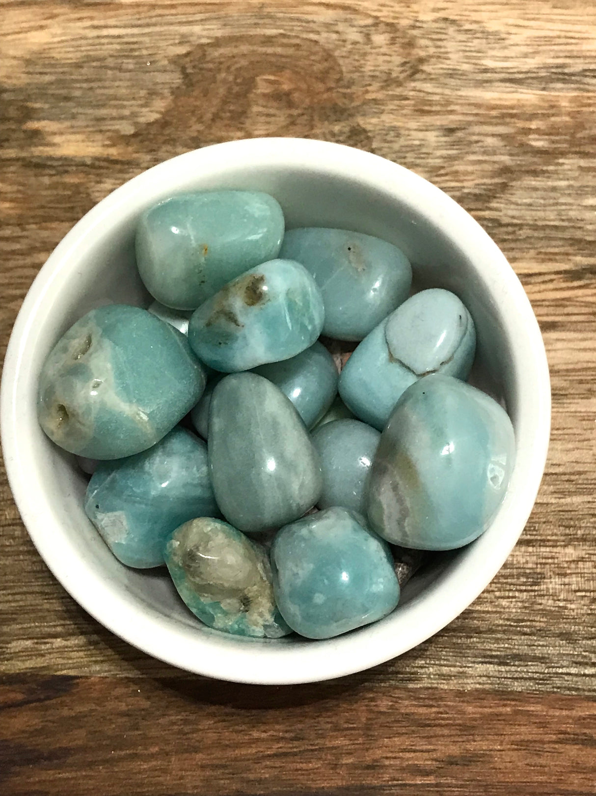 Amazonite tumbled stone in soothing turquoise-green tones — crystal of truth, harmony, and heartfelt communication.