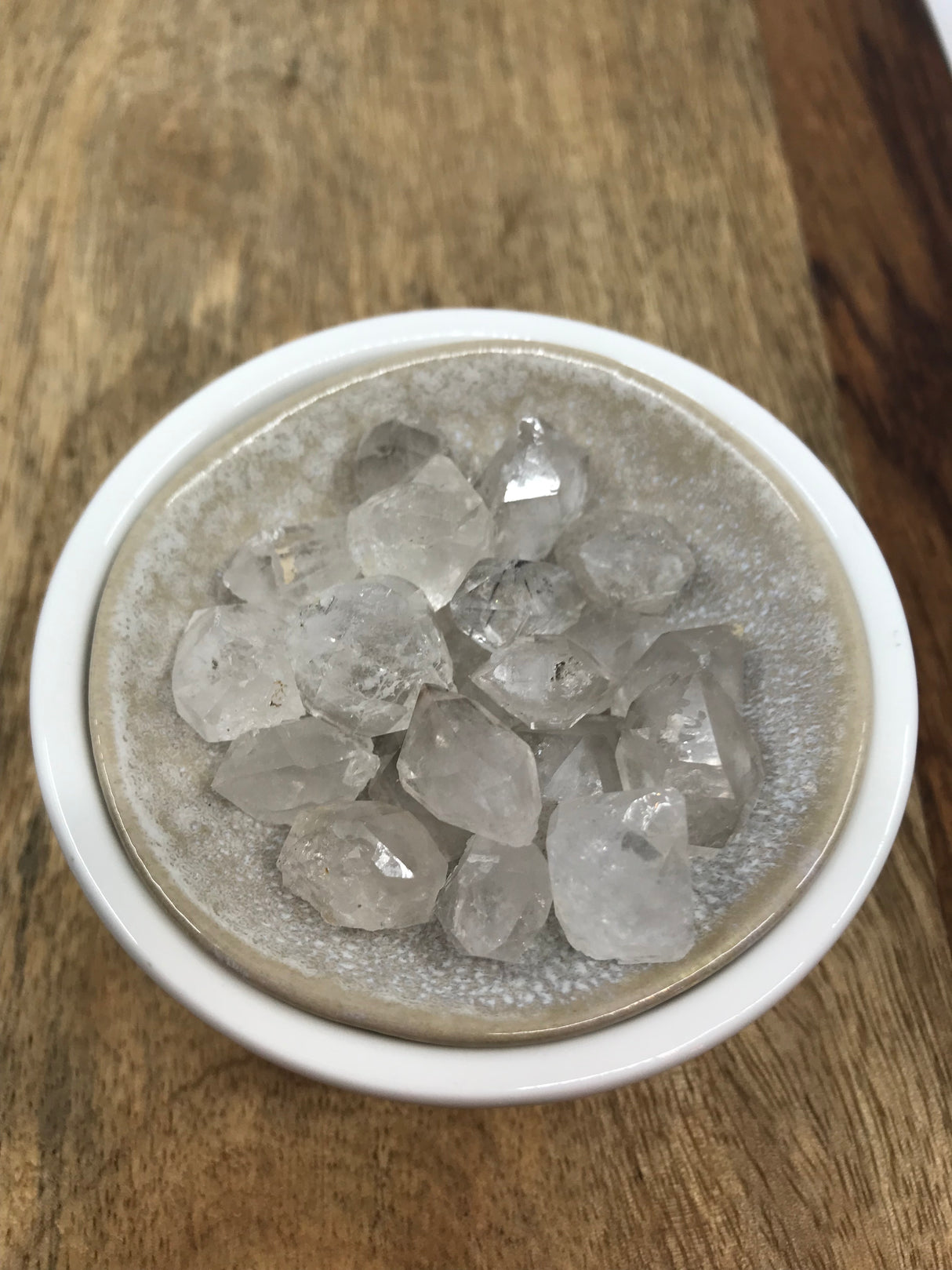 Herkimer Diamond tumbled stone with brilliant clear facets — crystal of clarity, attunement, and divine light.