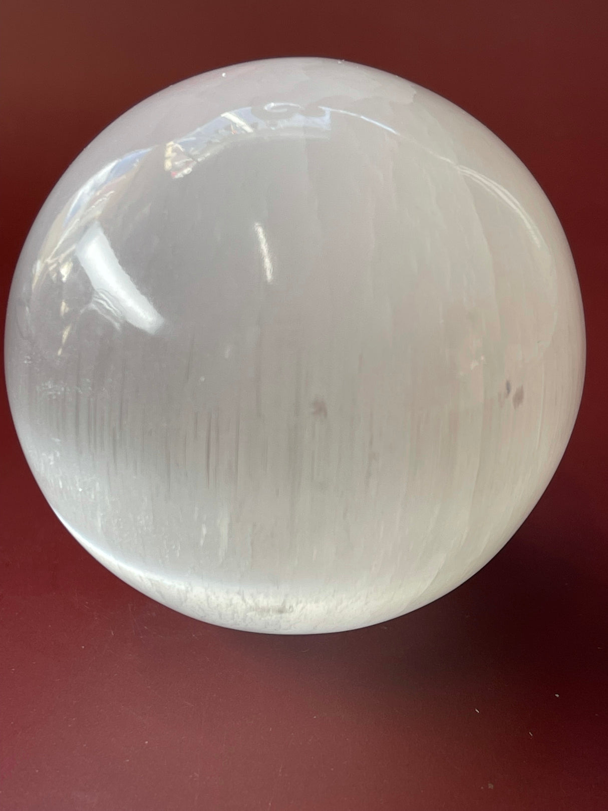 Selenite Sphere 8cm - "I am at one with myself, the Earth, and the Universe."