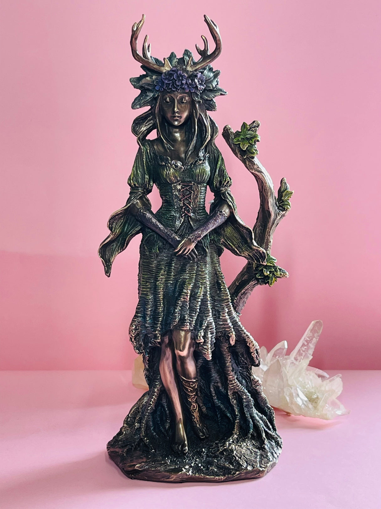 "Goddess Druantia statue with leaves and branches, Queen of the Druids and Lady of the Sacred Grove – symbol of nature and divine feminine wisdom"