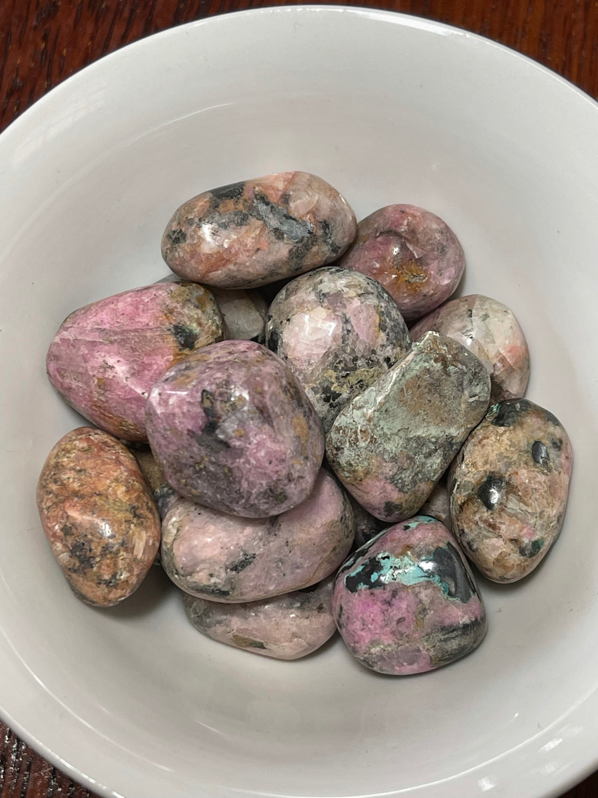 Cobaltoan Calcite tumbled stone in soft pink-violet tones — crystal of divine love, inner healing and heart awakening.