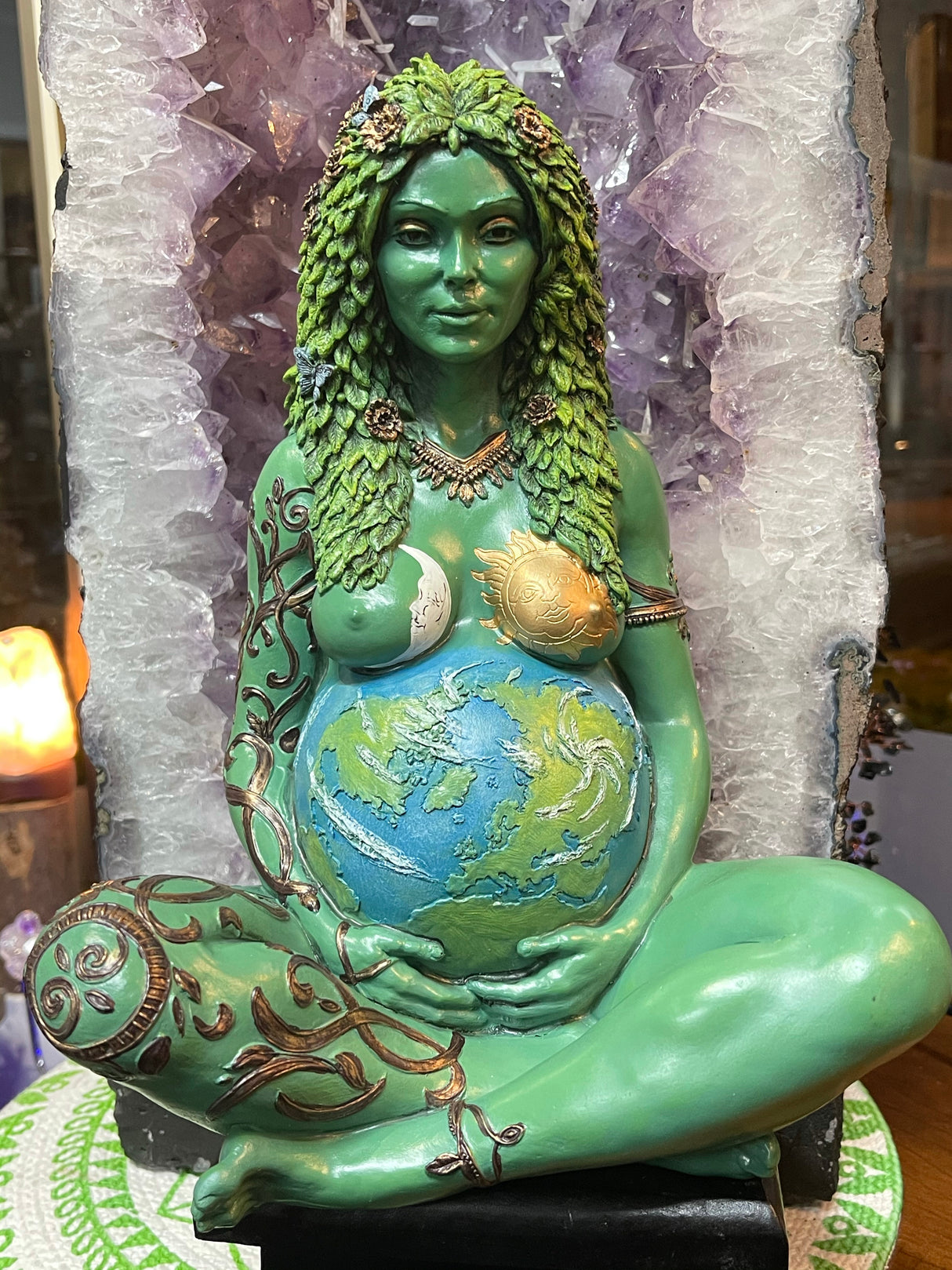 "Mother Earth bronze statue holding the world in her belly with sun and moon detail – symbol of life, balance, and rebirth"