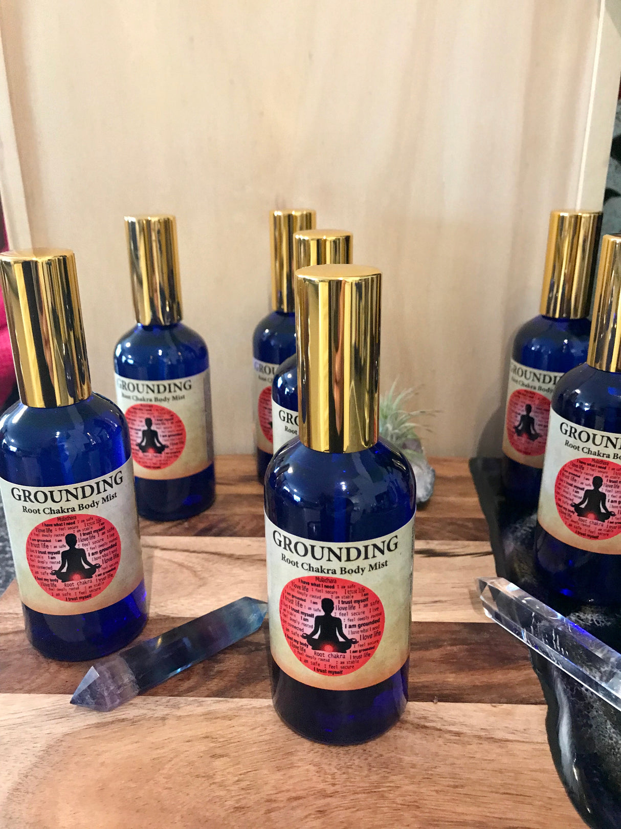 Grounding Chakra Mist bottle infused with Neroli and Patchouli essential oils, crystal-charged and Reiki-activated by Inspired By 3.