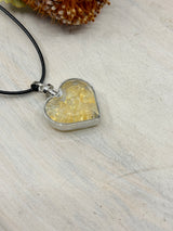 Citrine heart bottle pendant 40x32x11mm glass with platinum-plated alloy – filled with golden crystal chips for joy, success and abundance – Inspired By 3 Crystals Australia.