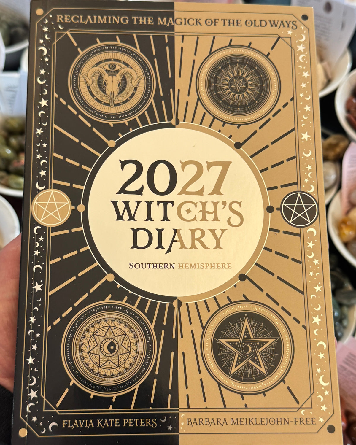 2027 Witch's Diary Southern Hemisphere by Flavia Kate Peters and Barbara Meiklejohn-Free, magical witchcraft planner with gold gatefold cover, moon phases, pagan Sabbats, goddess wisdom, crystal magic, spells and seasonal rituals for Australian witches.