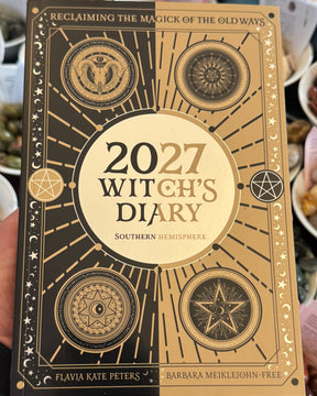 2027 Witch's Diary Southern Hemisphere by Flavia Kate Peters and Barbara Meiklejohn-Free, magical witchcraft planner with gold gatefold cover, moon phases, pagan Sabbats, goddess wisdom, crystal magic, spells and seasonal rituals for Australian witches.