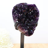 Dark uruguayan amethyst druzy cluster on black stand with deep purple crystals, 2.16kg statement piece for home or altar.