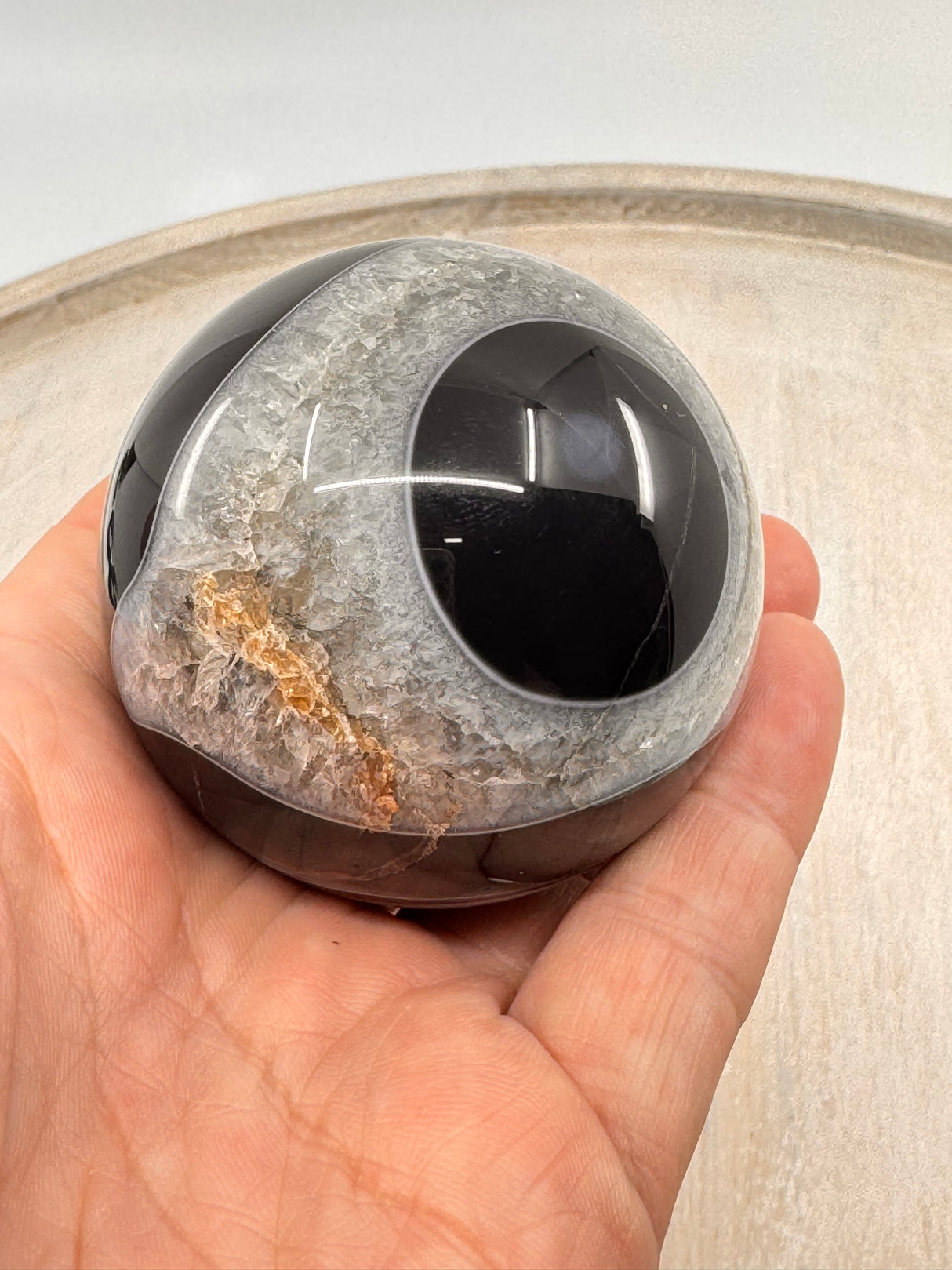Banded Black Agate Sphere 279g - "I release all behaviours that no longer serve me."