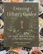 Entering Hekate’s Garden by Cyndi Brannen, herbal witchcraft book featuring mystical botanical illustrations, sacred green foliage, golden Hekate key and plant spirit magick.