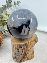 A 270 g Banded Black Agate Sphere for grounding, balance and emotional stability. A deeply protective Earth element stone that strengthens courage, focus and peace. Hand-selected by Inspired By 3 Crystals Australia.