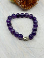 Amethyst stretch bracelet with stainless steel Buddha charm – 10mm natural beads, 6cm inner diameter – purple crystal bracelet for calm, intuition and protection – Inspired By 3 Crystals Australia.