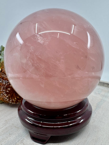 Rose Quartz sphere 3.416kg 11cm – gemmy pink crystal for love, compassion and healing – Inspired By 3 Crystals Australia.