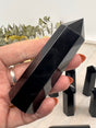 Black Obsidian Points 9–10 cm × 2.5 cm – glossy black crystal towers symbolising protection, grounding and transformation, intuitively selected by Inspired By 3 Australia.