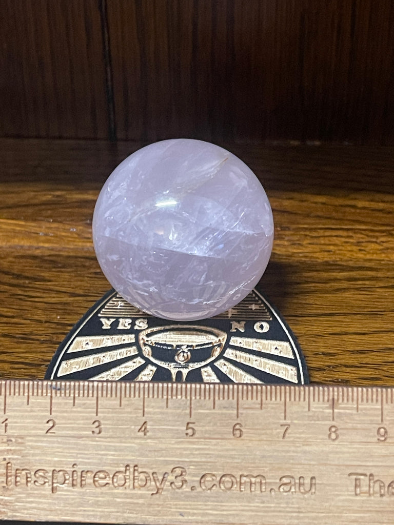 Rose Quartz Sphere on  Planchette Stand - “I radiate love, beauty, confidence and grace”.