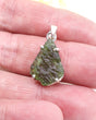 Genuine Czech Moldavite pendant in .925 sterling silver claw setting featuring natural green Moldavite from the Czech Republic.