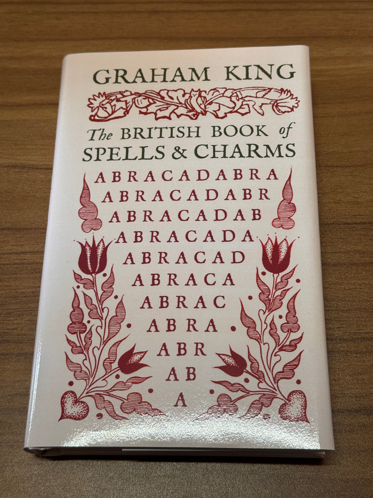 The British Book of Spells and Charms:  A Compilation of Traditional Folk Magic -  Graham King - Hardback