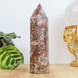 14cm Ocean Jasper point weighing 307g with red, cream and earthy marbled patterns polished into a point.