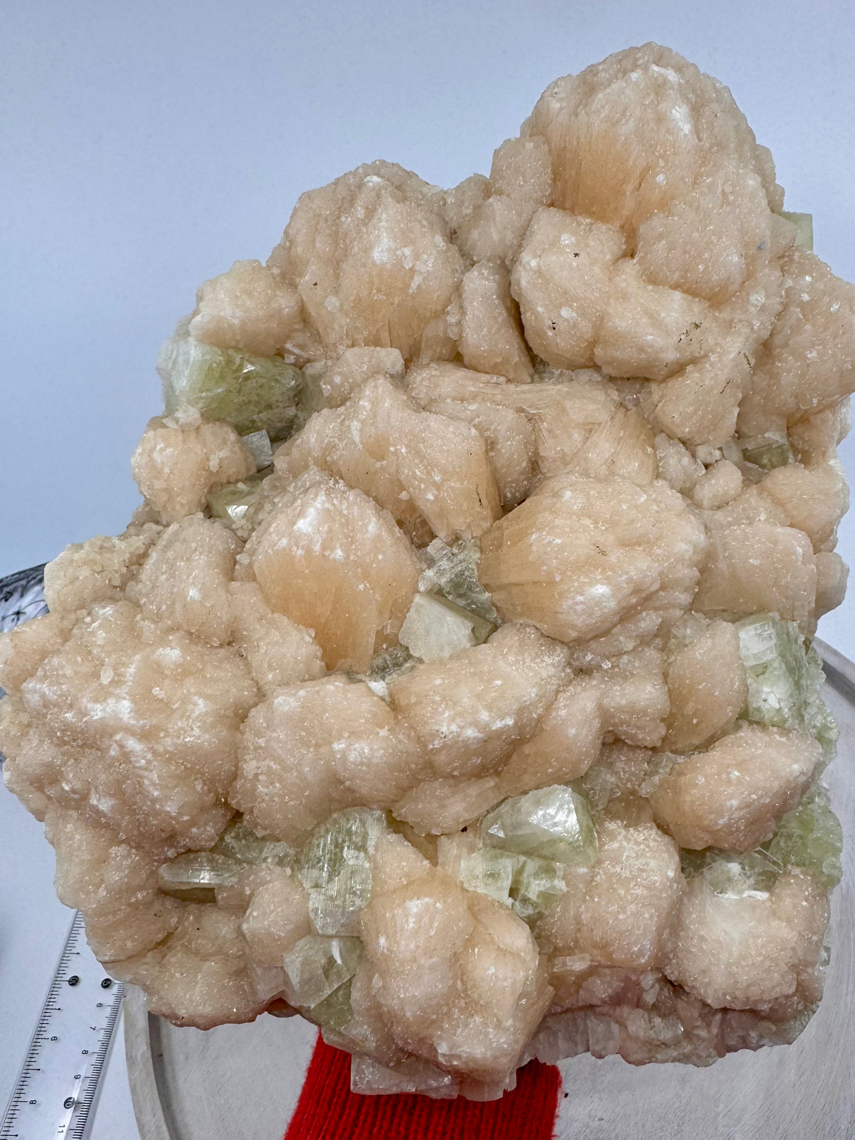 Shimmering green apophyllite and peach stilbite crystal cluster