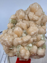 Shimmering green apophyllite and peach stilbite crystal cluster