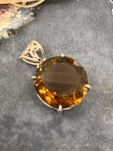 Smoky Quartz Round Silver Pendant - “My spirit is deeply grounded in the present moment”.