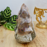 969g Ocean Jasper flame crystal measuring 15cm x 9cm with green, cream and earthy patterning displayed on wooden surface.