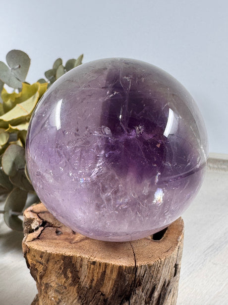 Amethyst Sphere – deep violet crystal sphere symbolising protection, divine light and higher consciousness, Inspired By 3 Australia.
