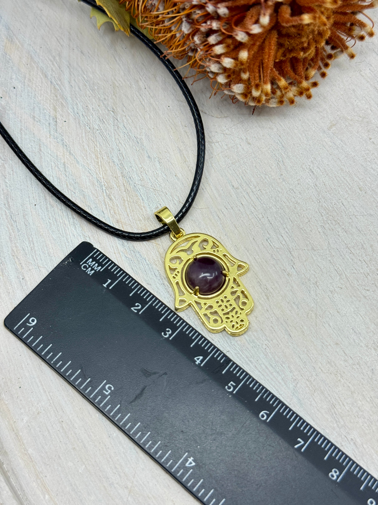 Amethyst Hamsa Hand pendant brass 33x22x6.5mm – purple crystal for protection, peace and intuition – Inspired By 3 Crystals Australia.