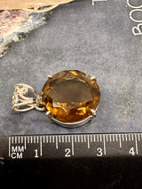 Smoky Quartz Round Silver Pendant - “My spirit is deeply grounded in the present moment”.