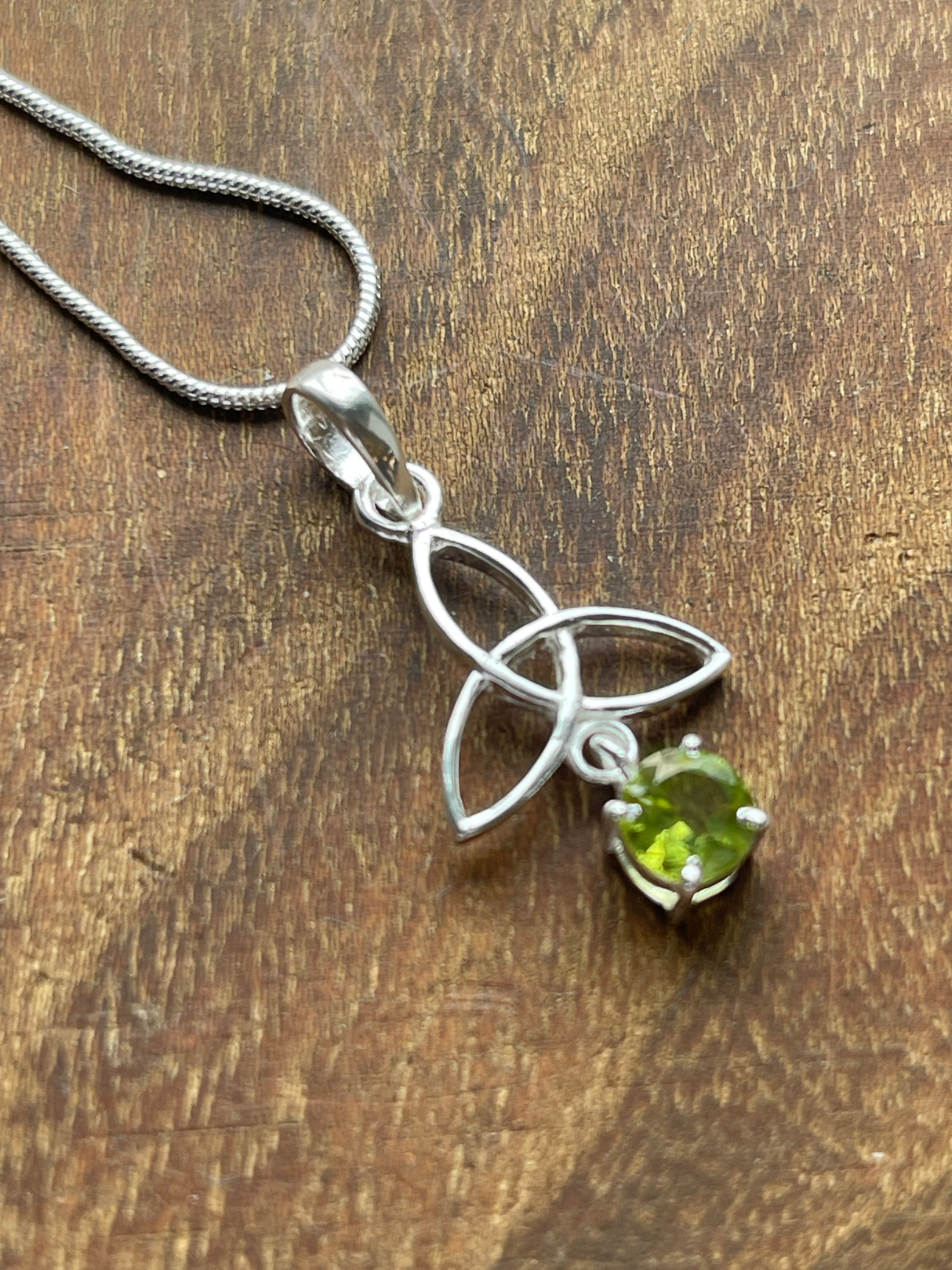 Peridot Silver Triquetra Pendant & Chain - “ I welcome abundance in all areas of my life”.