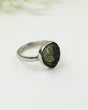 Genuine Czech Moldavite sterling silver ring featuring a natural freeform teardrop raw Moldavite gemstone in a handcrafted bezel setting, Size 7.